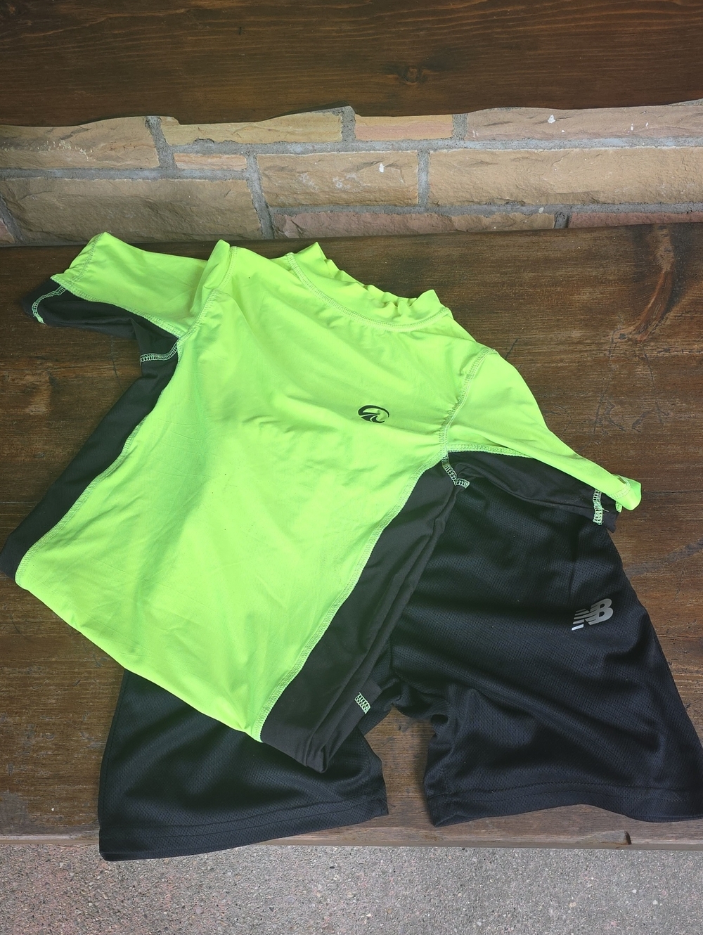 Neon Lime Active Top size 8 and Black New Balance Shorts size 10